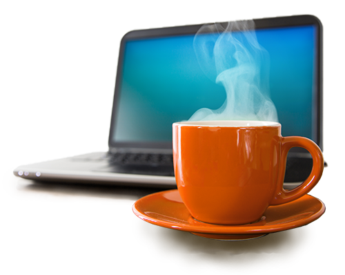 A steaming teacup and saucer in front of a laptop with a blank screen