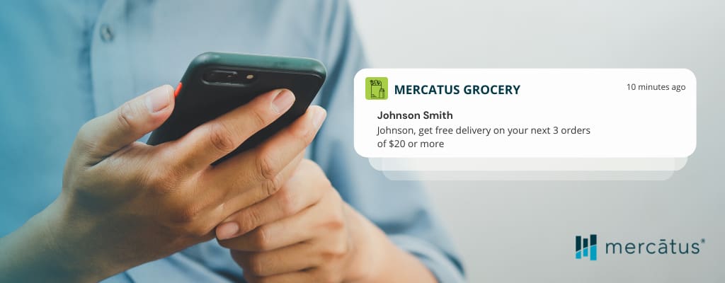 Mobile grocery app user receiving a notification about a new deal on their phone
